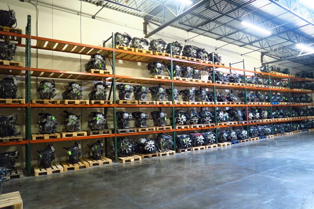 Warehouse racks full of tagged used engines